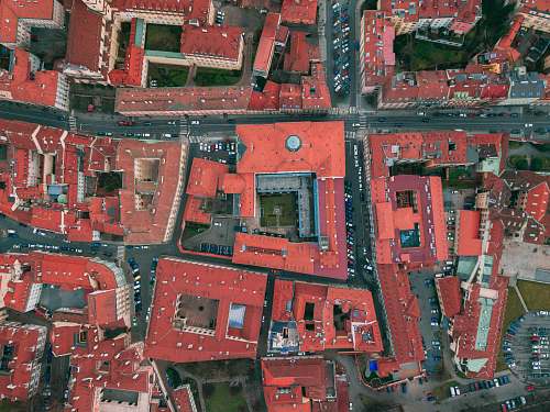 aerial view aerial photography of red concrete buildings at daytime landscape